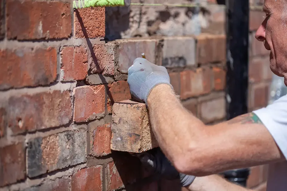 repairing damaged brick wall