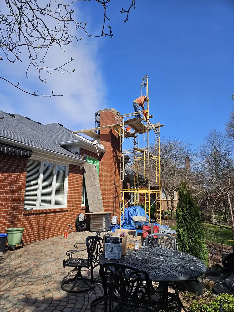 in process of brick chimney repair by Re-Brick Restoration